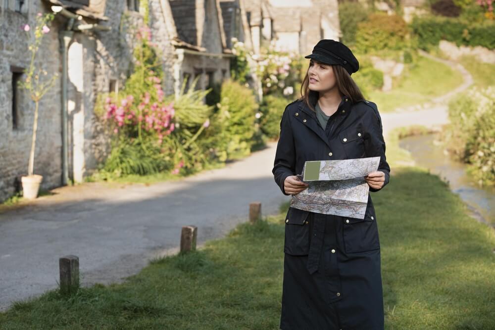 Solo traveler exploring local hidden gems in a charming village